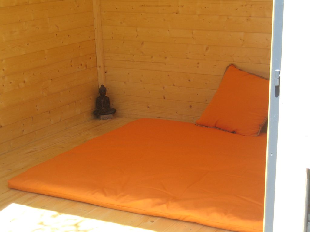 Le futon de massage dans la cabane